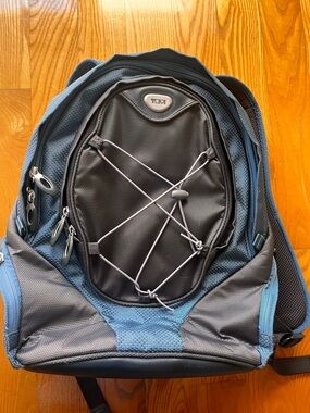 Tumi Black and Blue Travel Backpack with Front Bungee